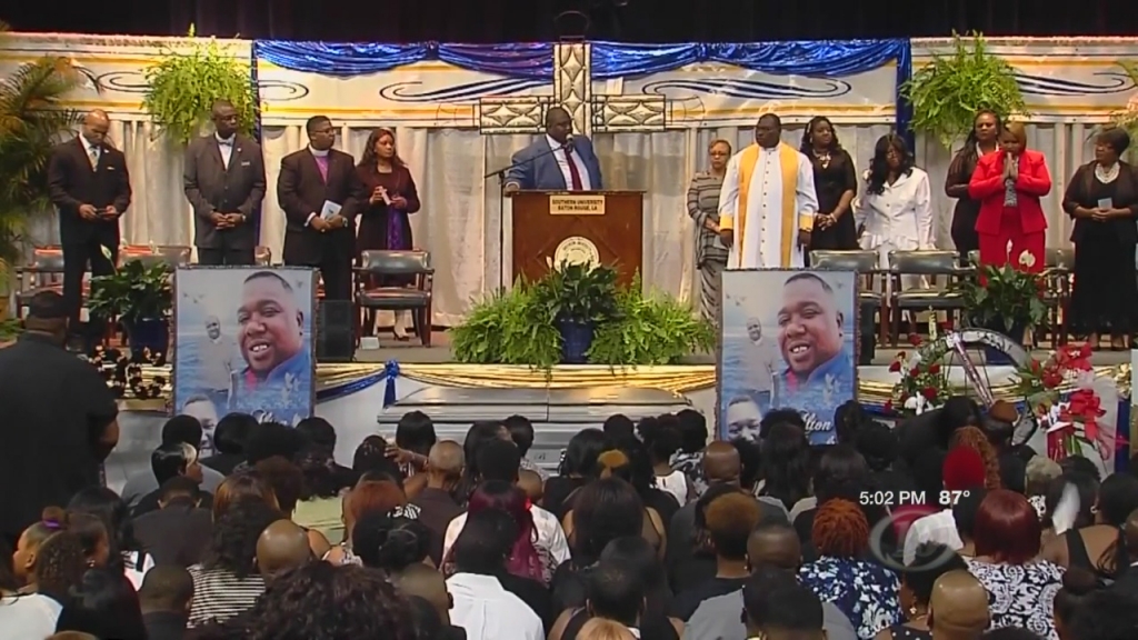 Mourners gather for funeral of black man killed by police