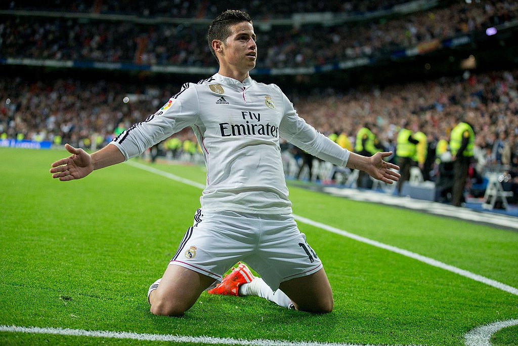 MADRID SPAIN- APRIL 18 James Rodriguez of Real Madrid CF celebrates scoring their second goal during the La Liga match between Real Madrid CF and Malaga CF at Estadio Santiago Bernabeu