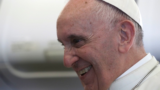 Pope Francis meets reporters during his flight to Poland | AP