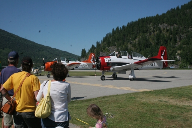 Bruce Evans a Calgary-based pilot attended the 2011 Nelson Flightfest in his T-28 Trojan aircraft on the left. — The Nelson Daily file