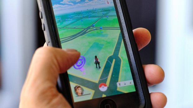 Pokemon Go is displayed on a cell phone in Los Angeles on Friday