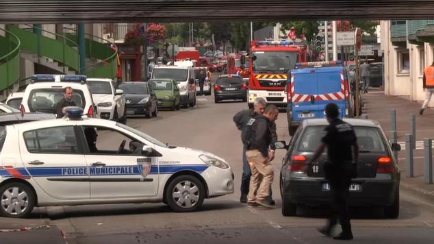 Police at the scene of the attack in Normandy France