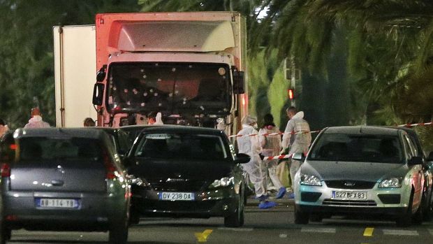 Police surround the truck that slammed into a Bastille Day crowd in NIce on Thursday