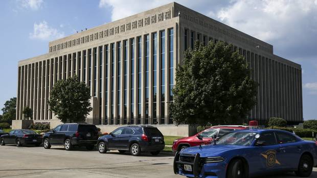 Police tape surrounds the Berrien County Court in Michigan after the shooting