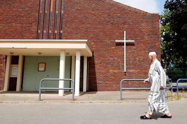 Assailants take hostages in Normandy church in France