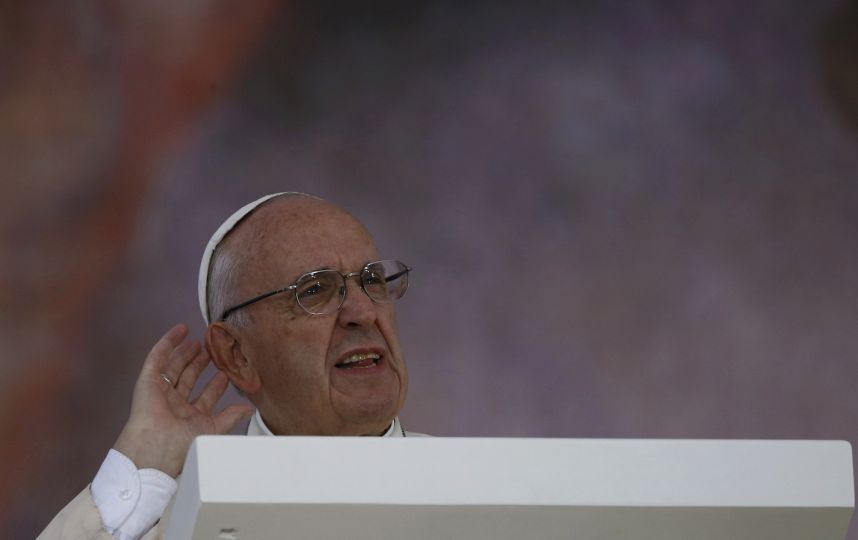 Pope Francis falls down steps during mass in Poland