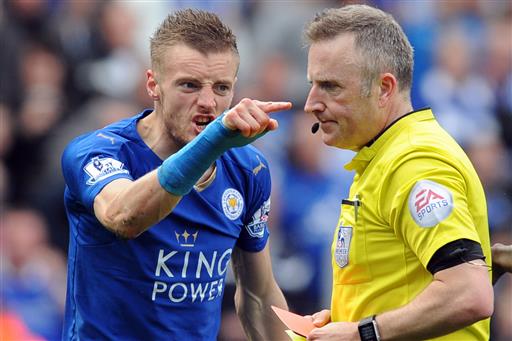 Leicester City's Jamie Vardy gestures to referee Jonathan Moss after being given a second yellow card and sent off during the English Premier League soccer match between Lei