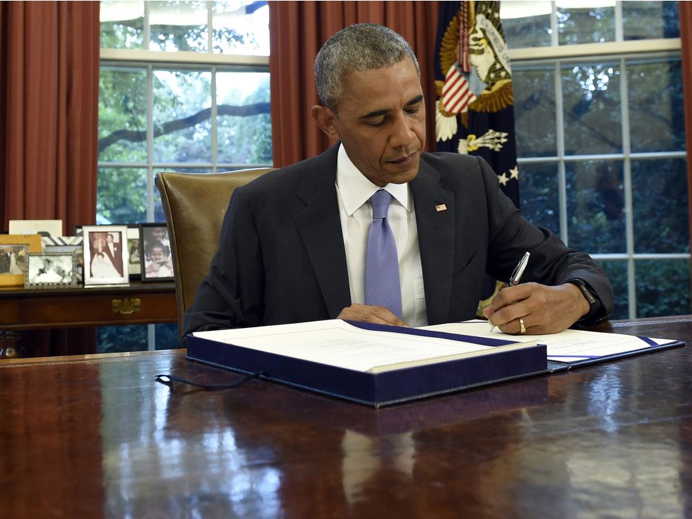 President Barack Obama at work in the Oval Office of the White House in Washington last month