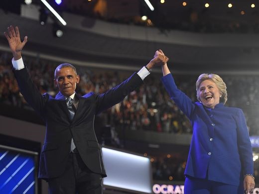 President Obama with Hillary Clinton after Obama spoke during the 2016 Democratic National Convention.  Robert Deutsch USA TODAY