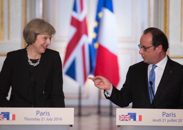 Prime Minister Theresa May holds a joint news conference with French President Francois Hollande at the Elysee Palace