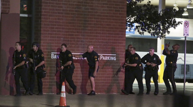 Dallas police respond after shots were fired during a protest over recent fatal shootings by police in Louisiana and Minnesota Thursday