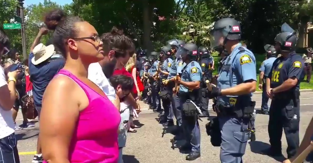 Protesters stood outside the governor’s mansion in St. Paul Minn. Some were arrested some came back when police pulled back