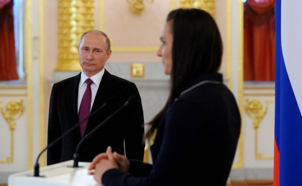 Putin spoke with two-time Olympic pole-vaulting champion Yelena Isinbayeva the most high-profile of the 67 track and field athletes banned from the games standing beside him at the Kremlin Moscow on 27 July 2016