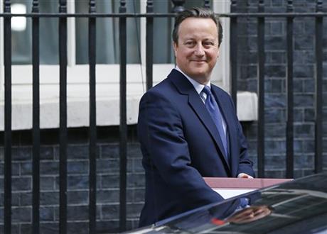 Britain's Prime Minister David Cameron leaves 10 Downing Street in London to face prime minister's questions for the last time Wednesday