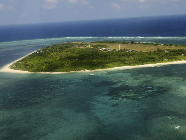 An aerial view shows the Pagasa Island part of the disputed Spratly group of islands in the South China Sea located off the coast of western Philippines