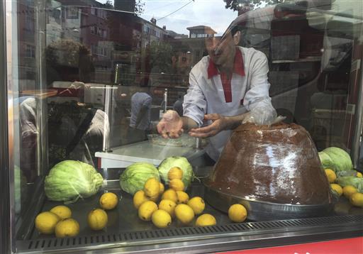 Ebuzer Ceyhan a 34-year-old sandwich shop owner in the same neighbourhood where Turkey's President Recep Tayyip Erdogan lived for a good 20 years as a young man before he became mayor of the city works in his store in Istanb