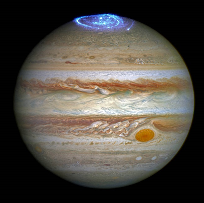 Astronomers are using NASA's Hubble Space Telescope to study auroras — stunning light shows in a planet's atmosphere — on the poles of the largest planet in the solar system Jupiter.
Credits NASA ESA and J. Nichols (University of Leicest