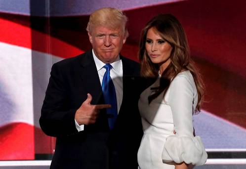 Republican US presidential candidate Donald Trump with his wife Melania after she concluded her remarks at the Republican National Convention in Cleveland Ohio