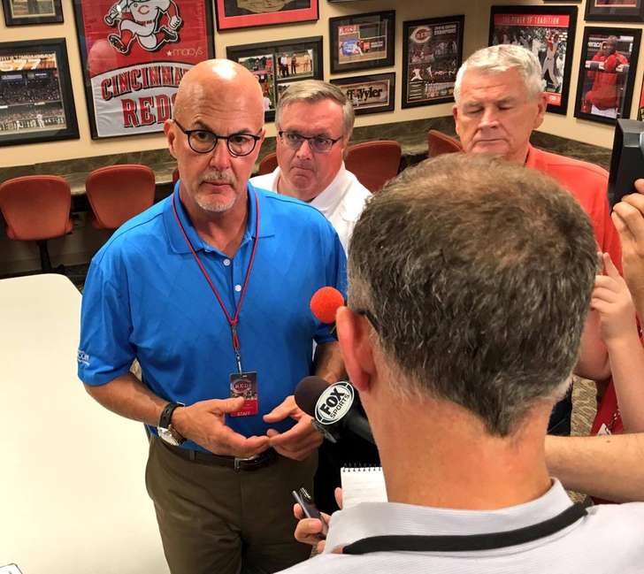 Reds Medical Director Dr. Tim Kremchek speaks to reporters on Monday. David Jablonski  Staff