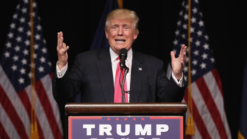 Republican Presidential candidate Donald Trump gestures during a speech in Virginia Beach Va. Monday