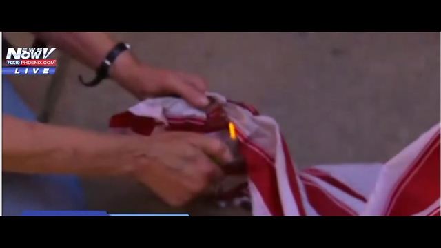 VIDEO: Cleveland Police swarm protesters burning U.S. flag outside RNC