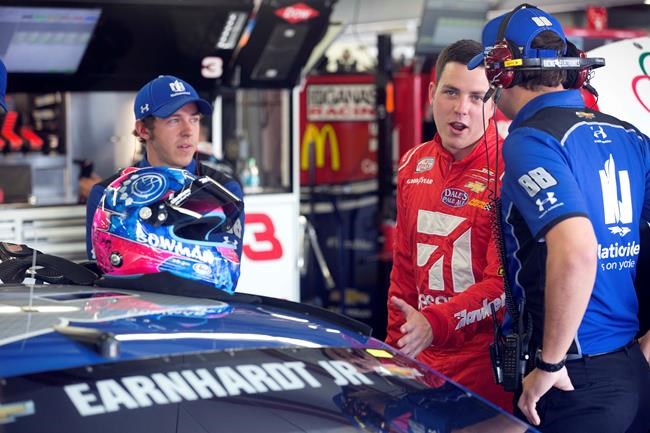 INDIANAPOLIS IN JULY 27 Jeff Gordon driver of the #24 Axalta Chevrolet celebrates with the trophy after winning the NASCAR Sprint Cup Series Crown Royal Presents The John Wayne Walding 400 at the Brickyard Indianapolis Motor Speedway