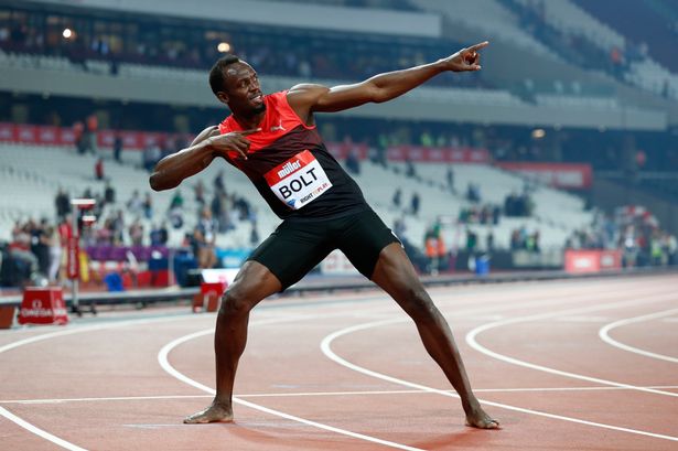 Jamaica's Usain Bolt celebrates after winning the Men's 200m