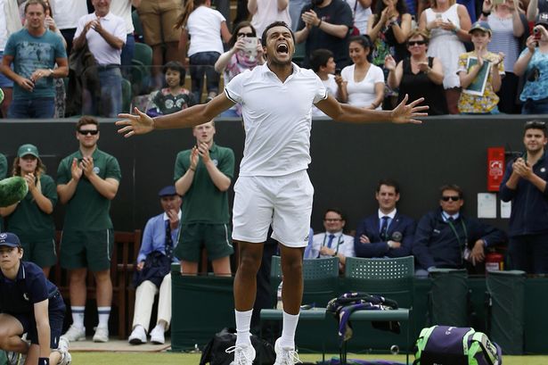 France's Jo Wilfried Tsonga celebrates winning his match against USA's John Isner