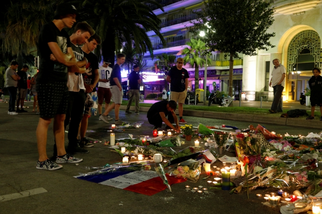 ReutersMourners gather in Nice after 84 people were killed on Thursday