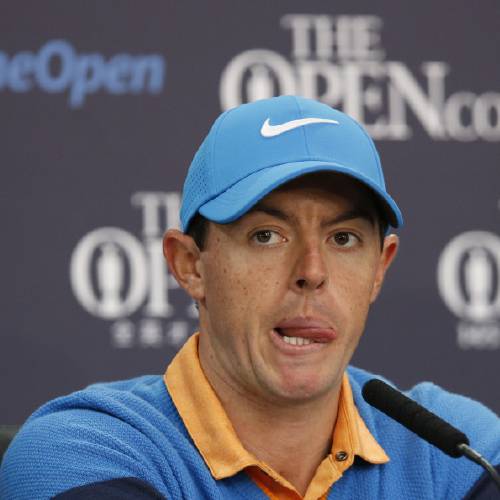 Ilroy of Northern Ireland listens to a question from the media at a press conference for the British Open Golf Championships at the Royal Troon Golf Club in Troon Scotland Tuesday