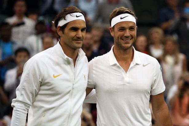 Roger Federer and Marcus Willis at Wimbledon on Wednesday