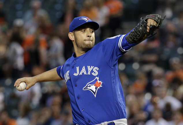 Toronto Blue Jays starting pitcher Marco Estrada throws to the Baltimore Orioles during the first inning of a baseb