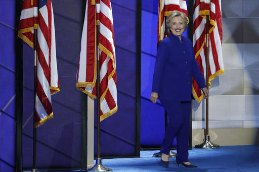 Democratic presidential nominee Hillary Clinton walks on stage after President Barack Obama's speech during the third day of the Democratic National Convention in Philadelphia, Wednesday