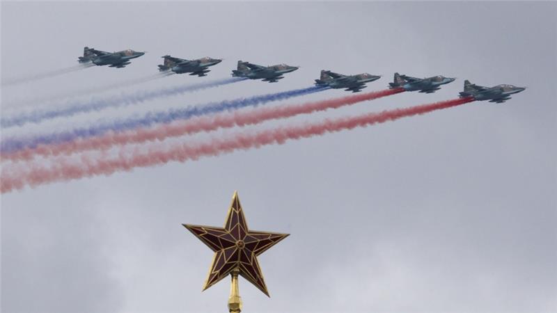 Russian Air Force Su-25 jets fly over Moscow's Kremlin during a general rehearsal for the Victory Day military parade