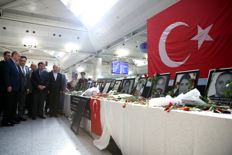 Turkey's President Recep Tayyip Erdogan left visits Ataturk Airport in Istanbul where