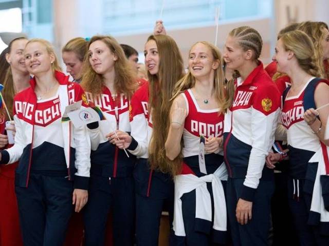 Russian Olympic team members attend a farewell ceremony for the Rio Games at Moscow's Sheremetyevo airport