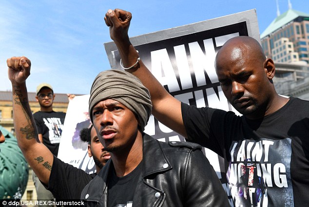 Salute Protesters made Black Power symbols as Nick Cannon spoke in downtown Cleveland in a Black Lives Matter protest