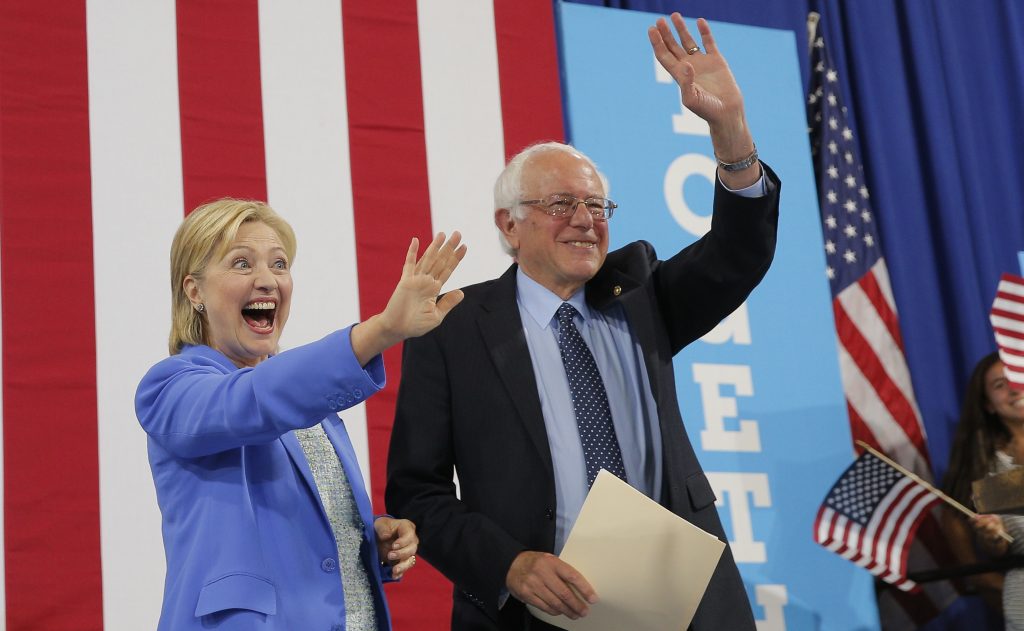 Democratic presidential candidate Hillary Clinton and Sen. Bernie Sanders attend a rally where Sanders endorsed Clinton in Portsmouth New Hampshire on July 12