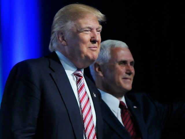 Republican presidential candidate Donald Trump and Republican vice presidential candidate Mike Pence are introduced at the 117th National Convention of the Veterans of Foreign Wars of the United States at the Charlotte Convention Center