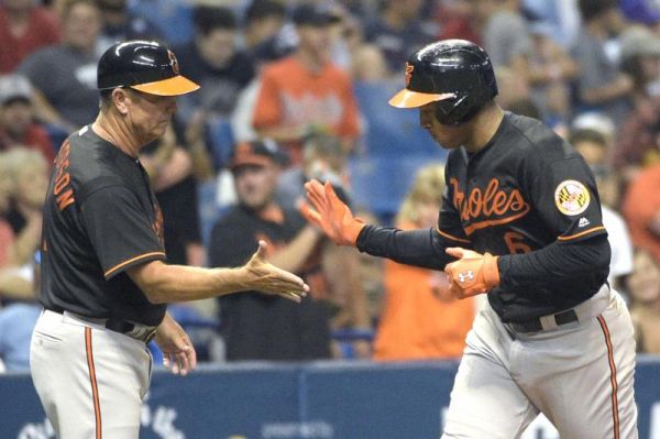 Baltimore Orioles Jonathan Schoop is congratulated