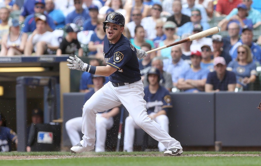 Scooter Gennett hits a single in the fifth inning against the Cubs