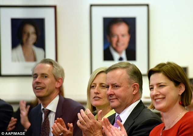 Shadow Minister for Infrastructure Anthony Albanese applauds Bill Shorten at a Labor Party Caucus meeting on Friday