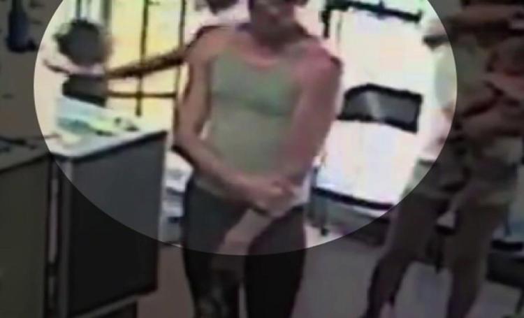 Shocking surveillance footage shows a man — who police have identified as Terry Ransom — snatching a young child from a cell phone store