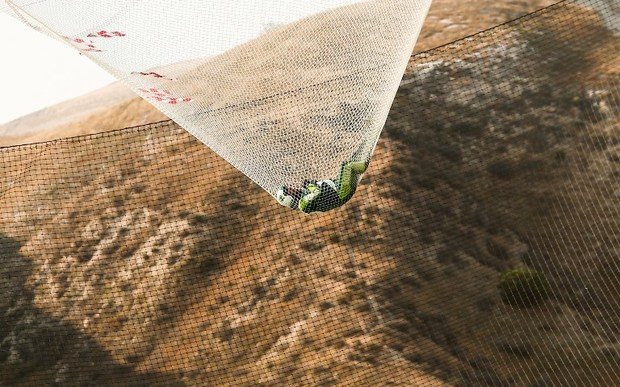 Skydiver Luke Aikins lands safely after jumping 25,000 feet from an airplane without a parachute or wing suit