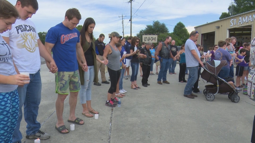 Louisiana community gathers at vigil for fallen Baton Rouge police officers