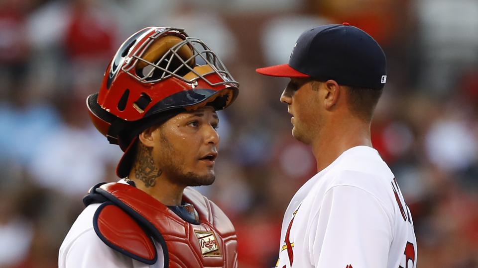 St. Louis Cardinals starting pitcher Mike Mayers right talks with catcher Yadier Molina after allowing a grand slam to Los Angeles Dodgers Adrian Gonzalez during the first inning of a baseball game Sunday