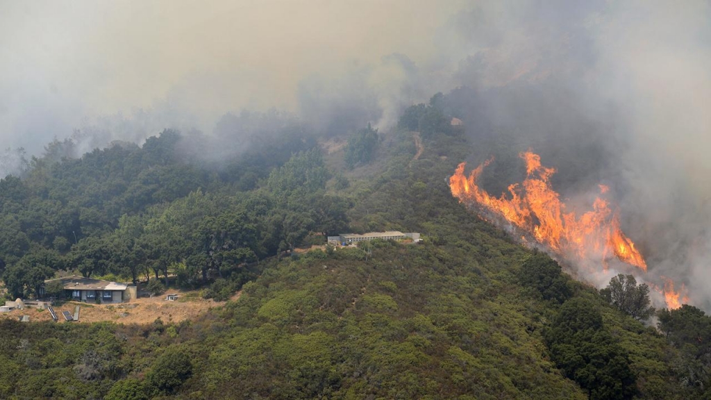 Some of the most famed coastline in California is under threat as wildfires continue to roar