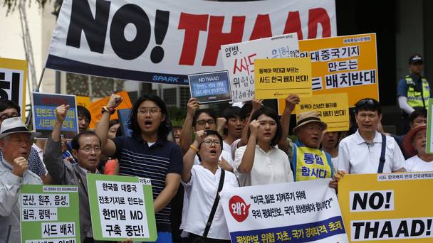 South Koreans shout slogans during a rally to denounce deploying the US's Terminal High Altitude Area Defence or Thaad system