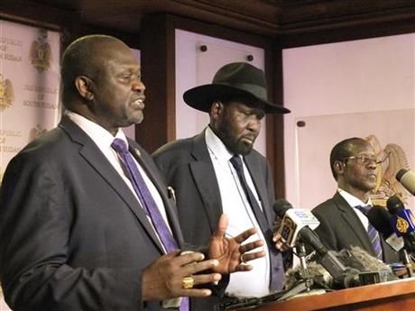 South Sudanese Vice President Riek Machar left and President Salva Kiir centre call for calm at the presidential