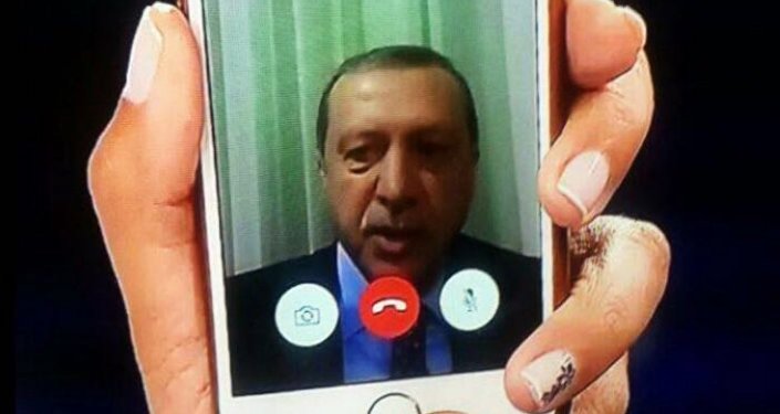 Telephone statement by Turkish President Recep Tayyip Erdogan shown on the news on TV at an Istanbul home